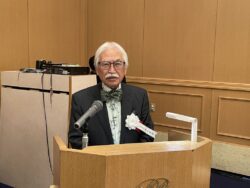 第１部新春記念講演会司会中の景山一般社団法人千葉南法人会総務委員長